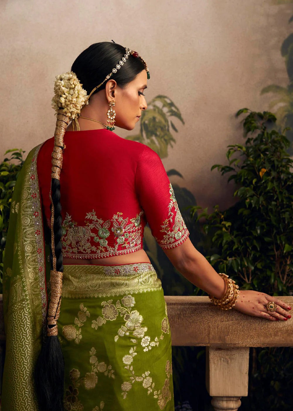 Dhiyona KM Women Glamorous Green Zari Woven Dola Silk Wedding Saree With Red Blouse