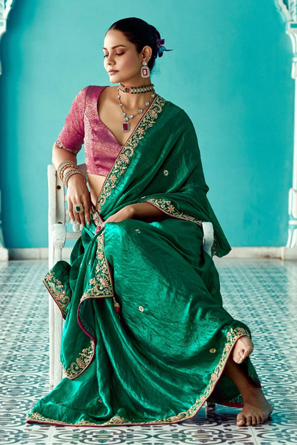 Dhiyona KM Women Green Embroidery Pure Tissue Silk Saree With Red Blouse & Crush Fabric