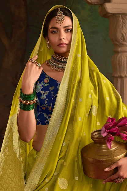 Dhiyona KM Women Yellow Banarasi Dola Silk Saree With Contrasting Blue Blouse