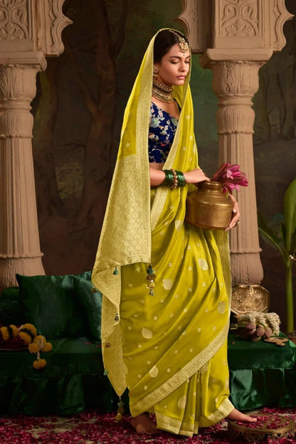 Dhiyona KM Women Yellow Banarasi Dola Silk Saree With Contrasting Blue Blouse
