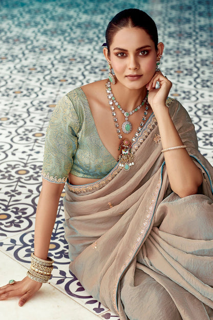Dhiyona KM Women Beige Embroidery Tissue Silk Saree With Sea Green Blouse