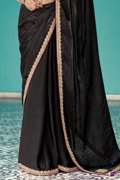 Dhiyona KM Women Black Tissue Silk Saree With Golden Border & Purple Blouse