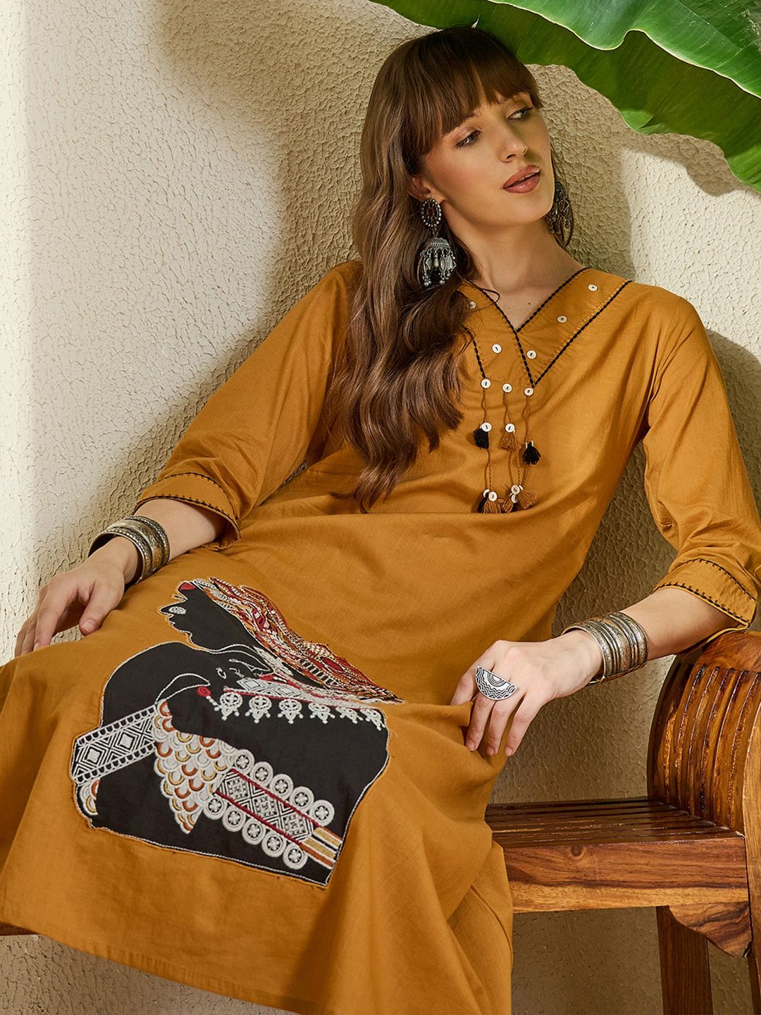Women Mustard Embroidered A-Line Kurta Trousers Set