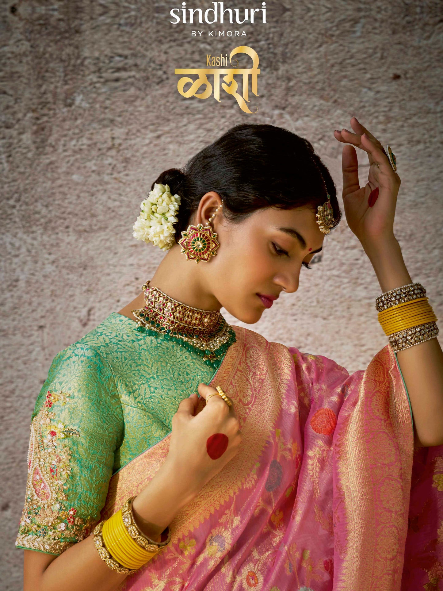 Dhiyona KM Women Pastel Pink Banarasi Silk Saree With Zari Weaving & Contrast Green Embroidered Blouse