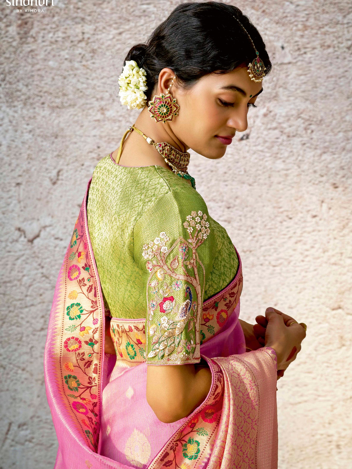 Dhiyona KM Women Graceful Pink Banarasi Silk Saree With Contrast Green Designer Blouse