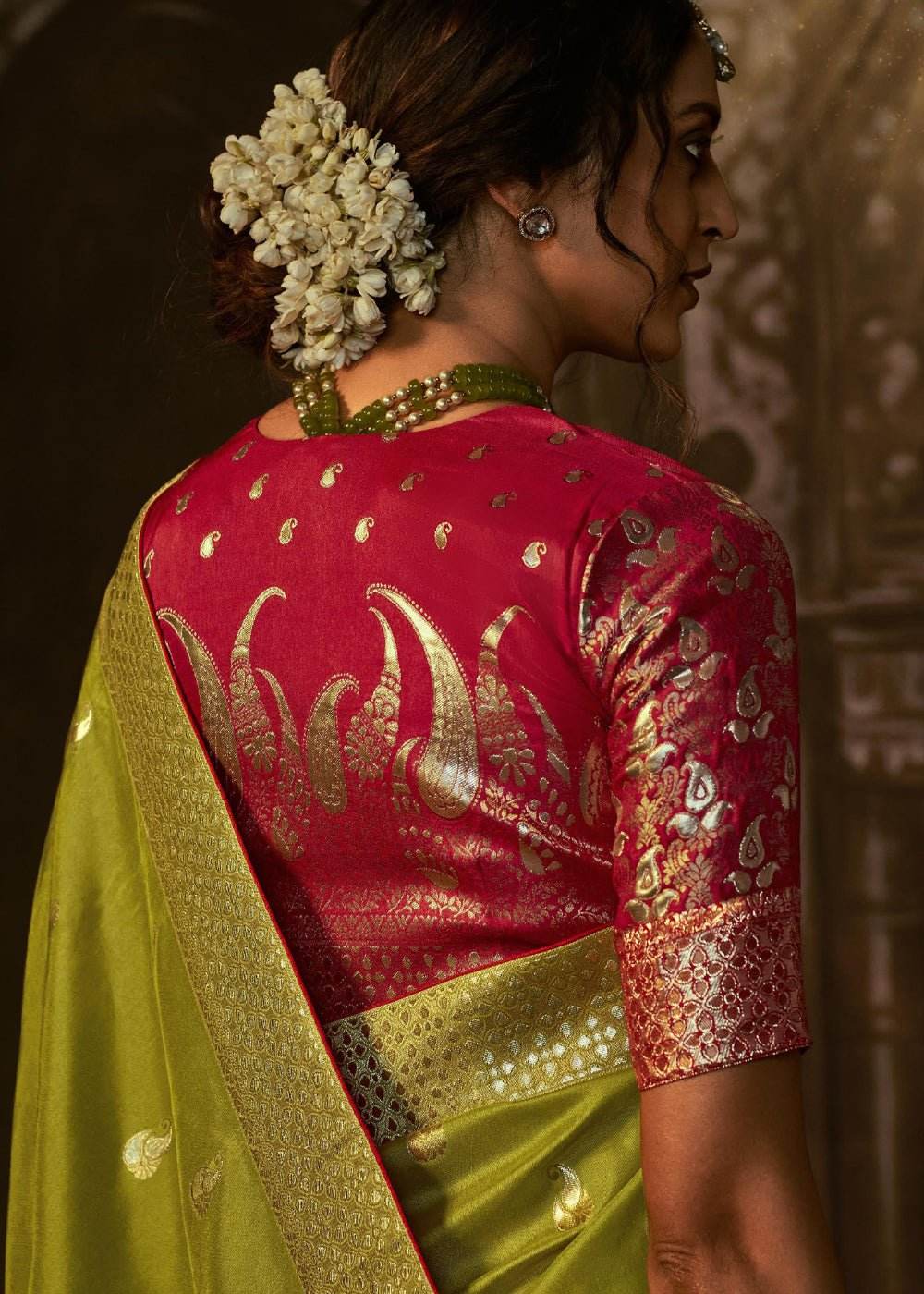 Dhiyona KM Women Green Banarasi Silk Saree With Rich Golden Zari & Red Contrast Blouse