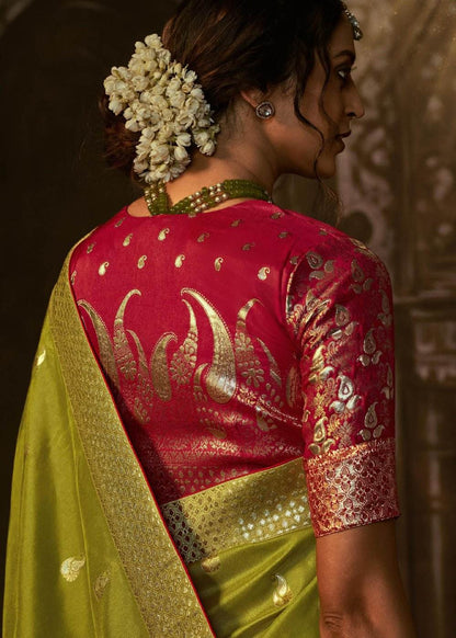 Dhiyona KM Women Green Banarasi Silk Saree With Rich Golden Zari & Red Contrast Blouse