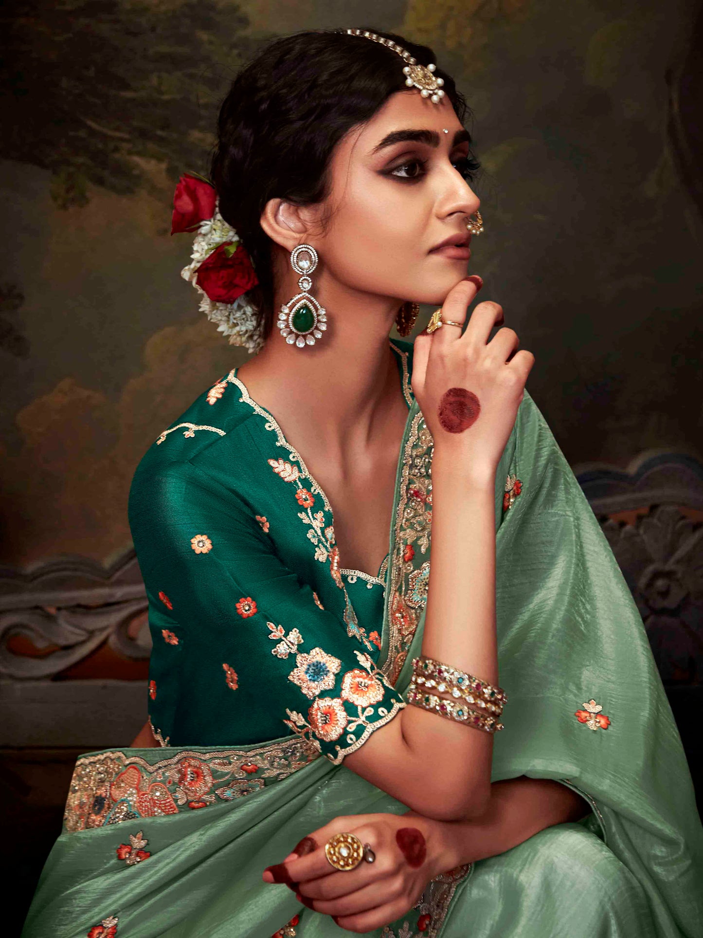 Dhiyona KM Women Regal Sea Green Tissue Silk Saree With Intricately Embroidered Bottle Green Blouse