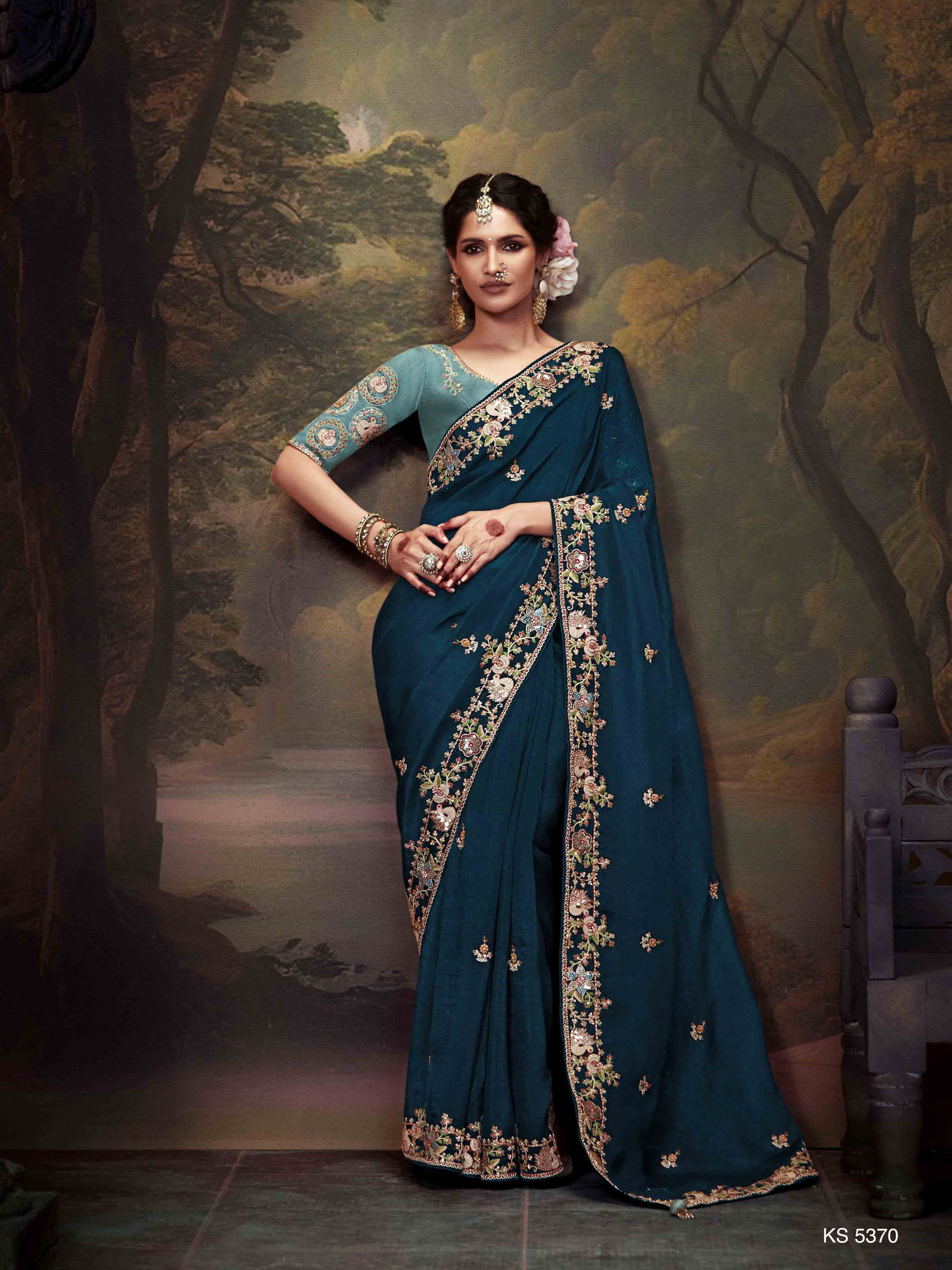 Dhiyona KM Women Teal Blue Designer Organza Silk Saree With Heavy Embroidered Floral Border And Contrast Blouse