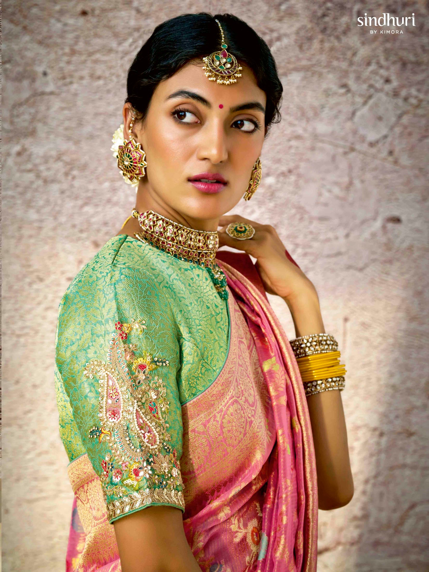 Dhiyona KM Women Graceful Pink Banarasi Silk Saree With Contrast Green Designer Blouse