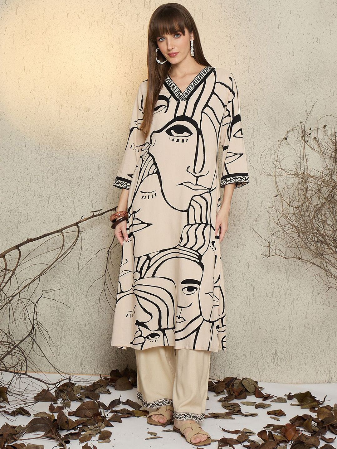 Women Abstract Printed Regular Straight Kurta with Trousers