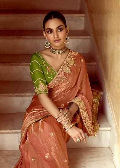 Dhiyona KM Women Peach Designer Tissue Silk Saree With Green Blouse