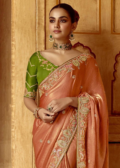 Dhiyona KM Women Peach Designer Tissue Silk Saree With Green Blouse