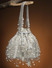 Dhiyona NR Embellished Tasselled Potli Clutch