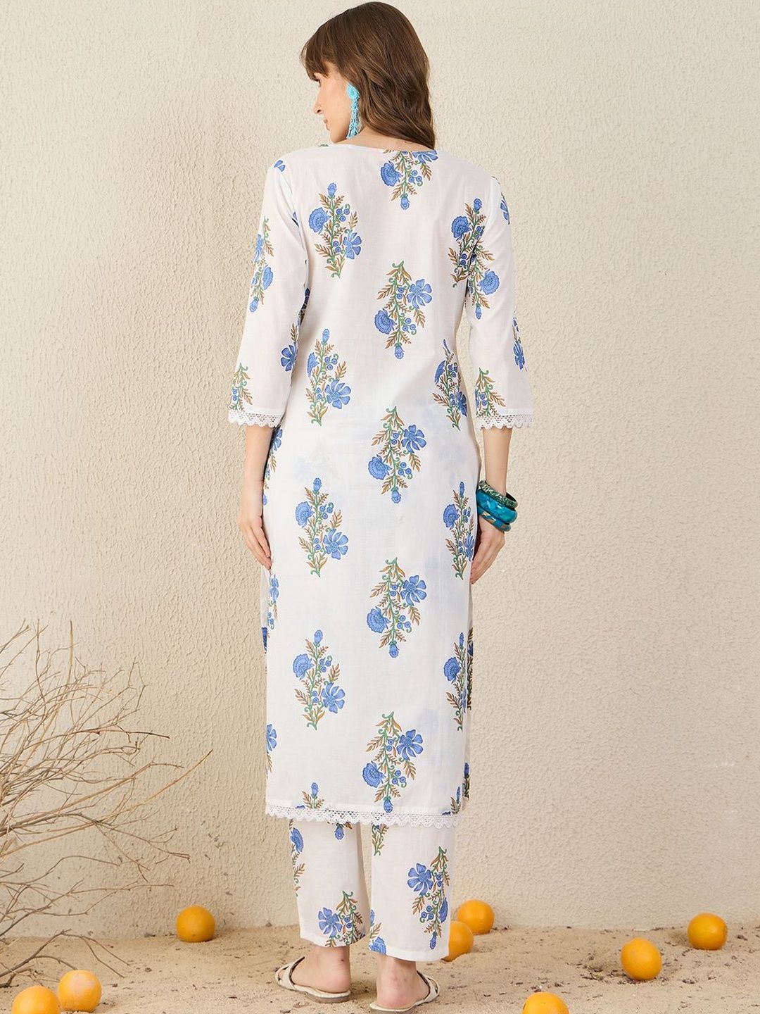 Women Floral Printed Cotton Kurta with Trousers