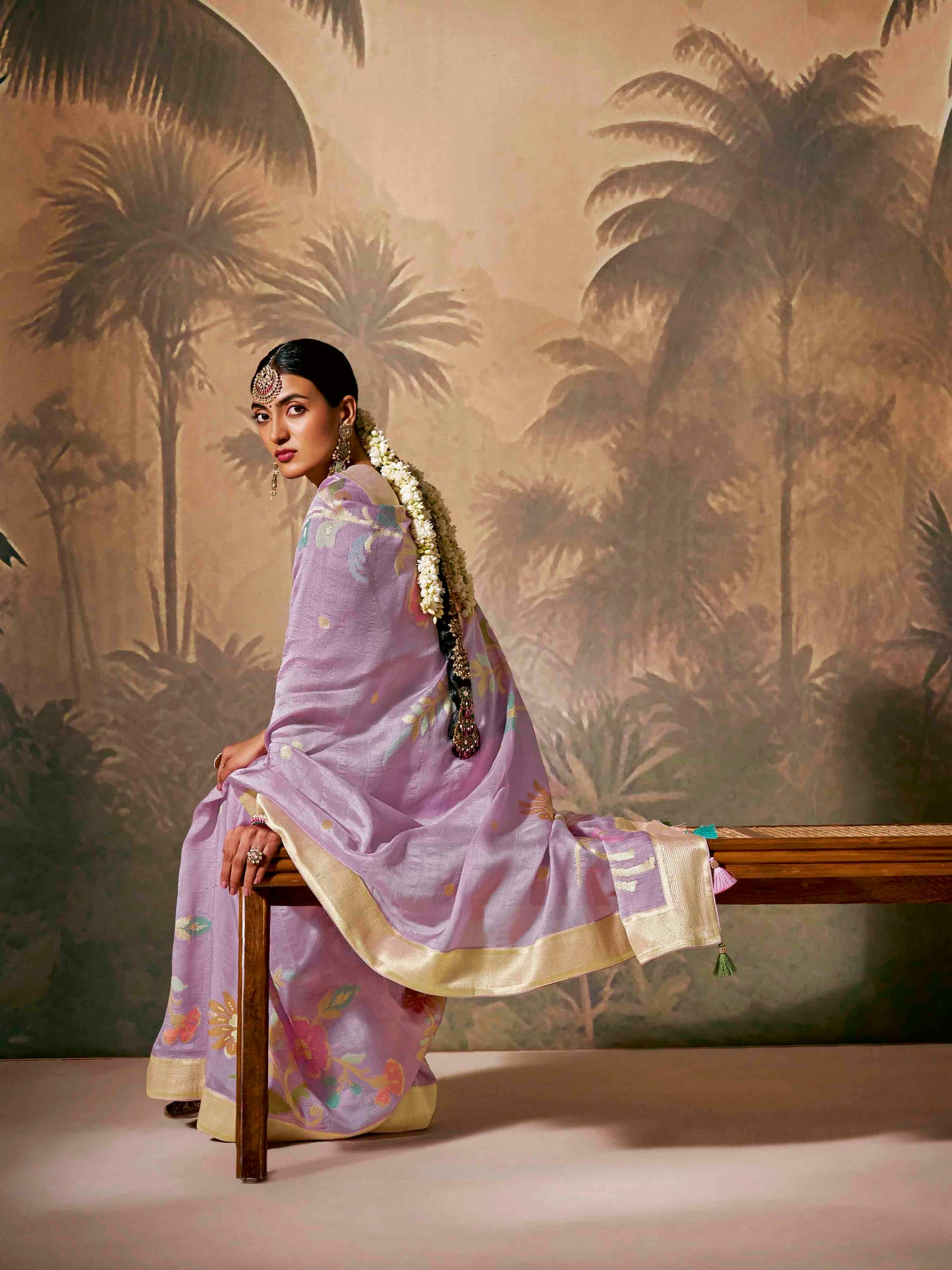 Dhiyona KM Women Royal Purple Silk Saree With Stunning Contrast Green Blouse