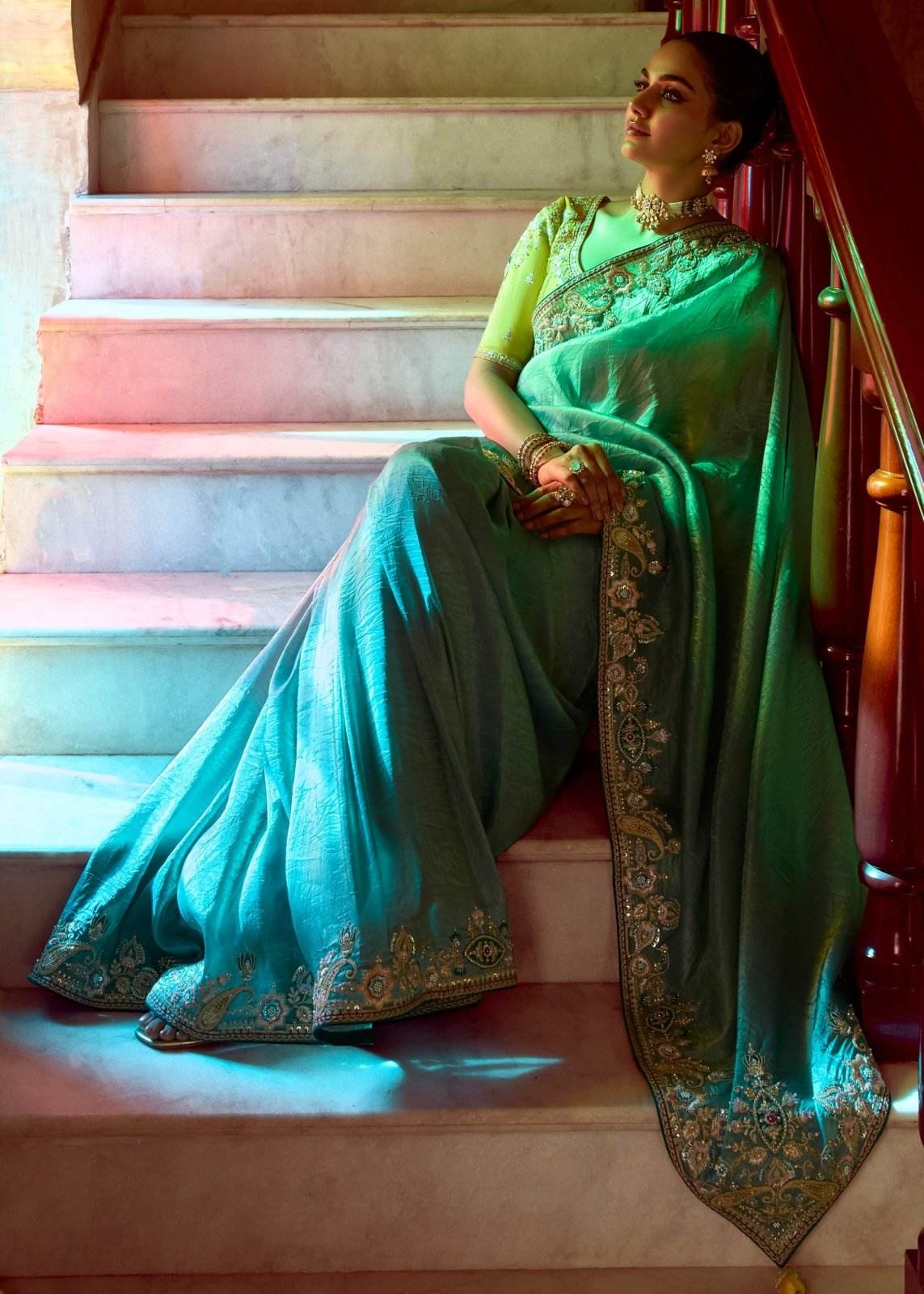 Dhiyona KM Women Teal Designer Tissue Silk Saree
