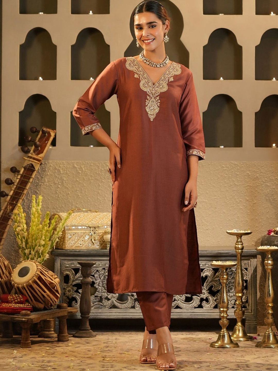 Women Solid Embroidered Kurta with Trousers