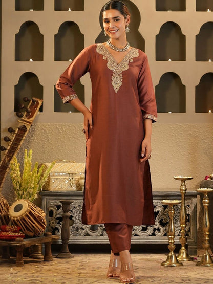 Women Solid Embroidered Kurta with Trousers