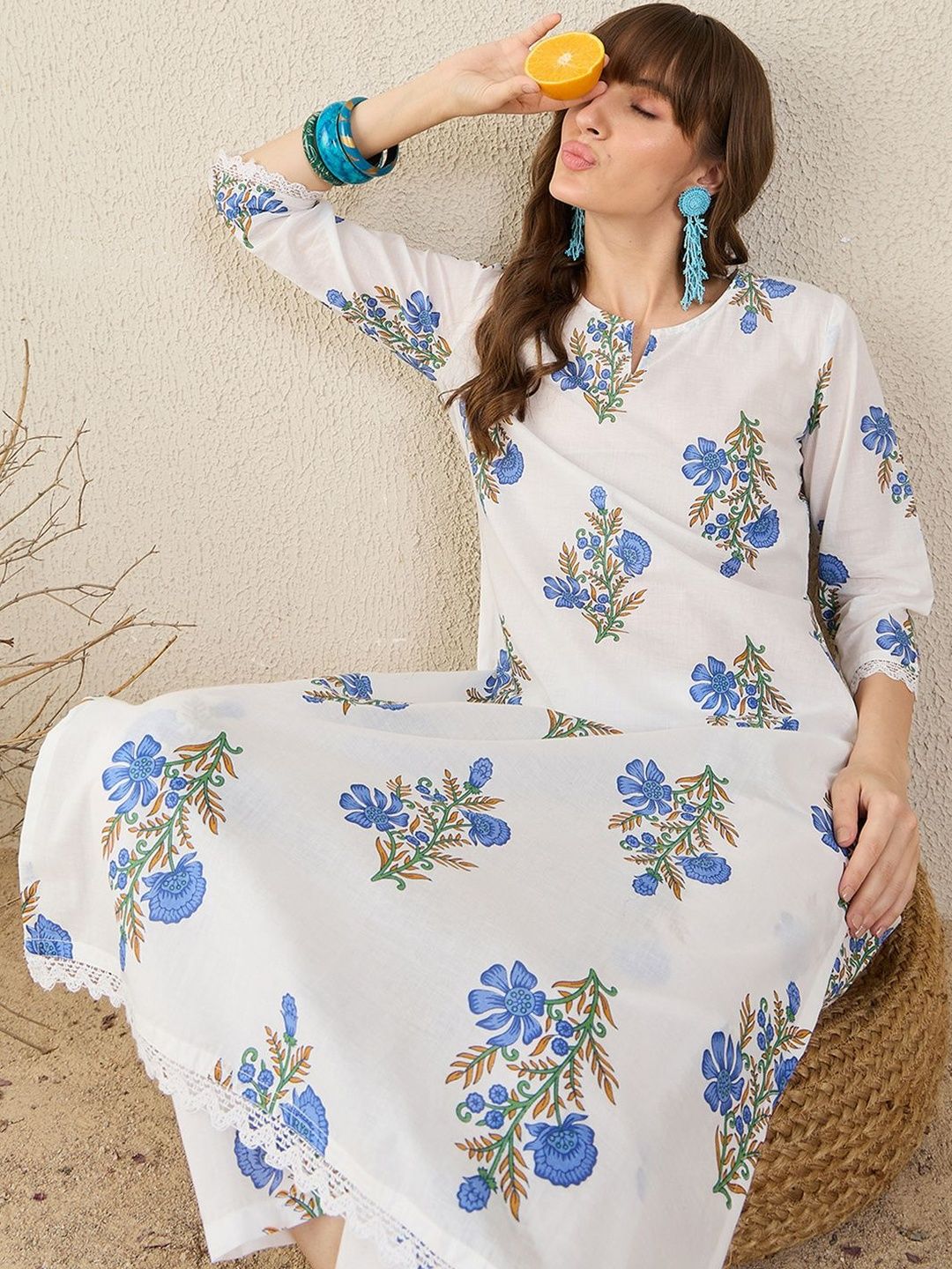 Women Floral Printed Cotton Kurta with Trousers