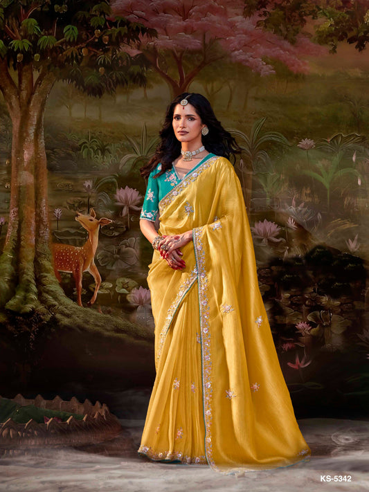 Dhiyona KM Women Yellow Silk Embroidered Butta Saree With Teal Blouse