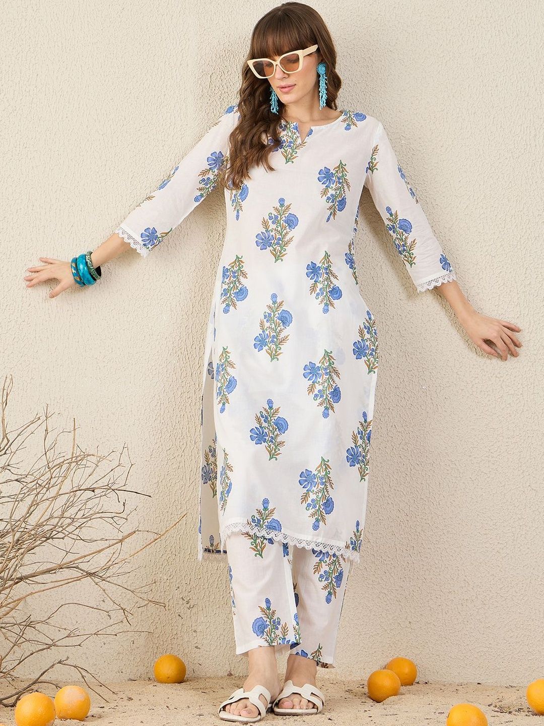 Women Floral Printed Cotton Kurta with Trousers
