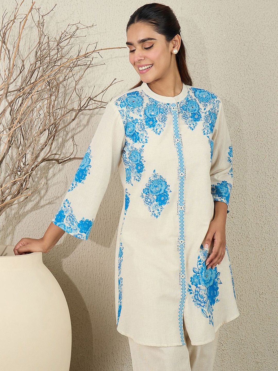 Women Floral Printed Cotton Kurta with Trousers