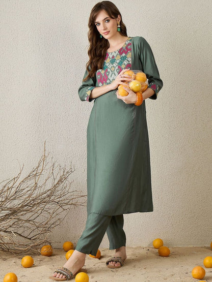 Women Embroidered Regular Thread Work Kurta with Trousers