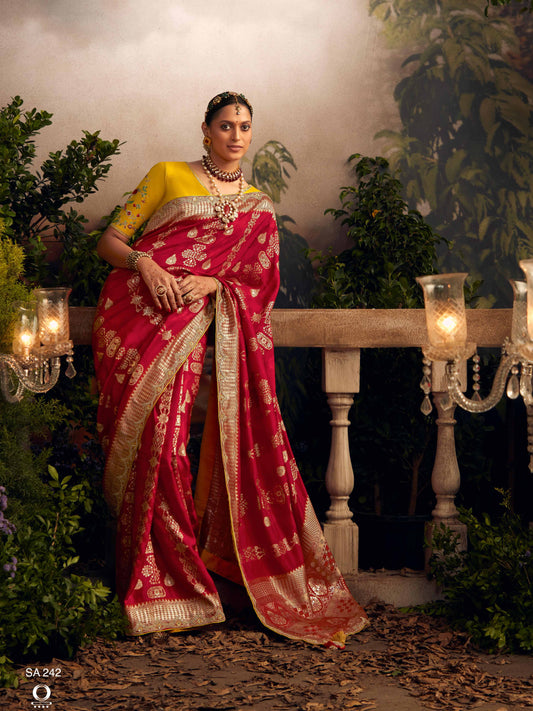 Dhiyona KM Women Classic Red Banarasi Silk Saree With Yellow Embroidered Blouse