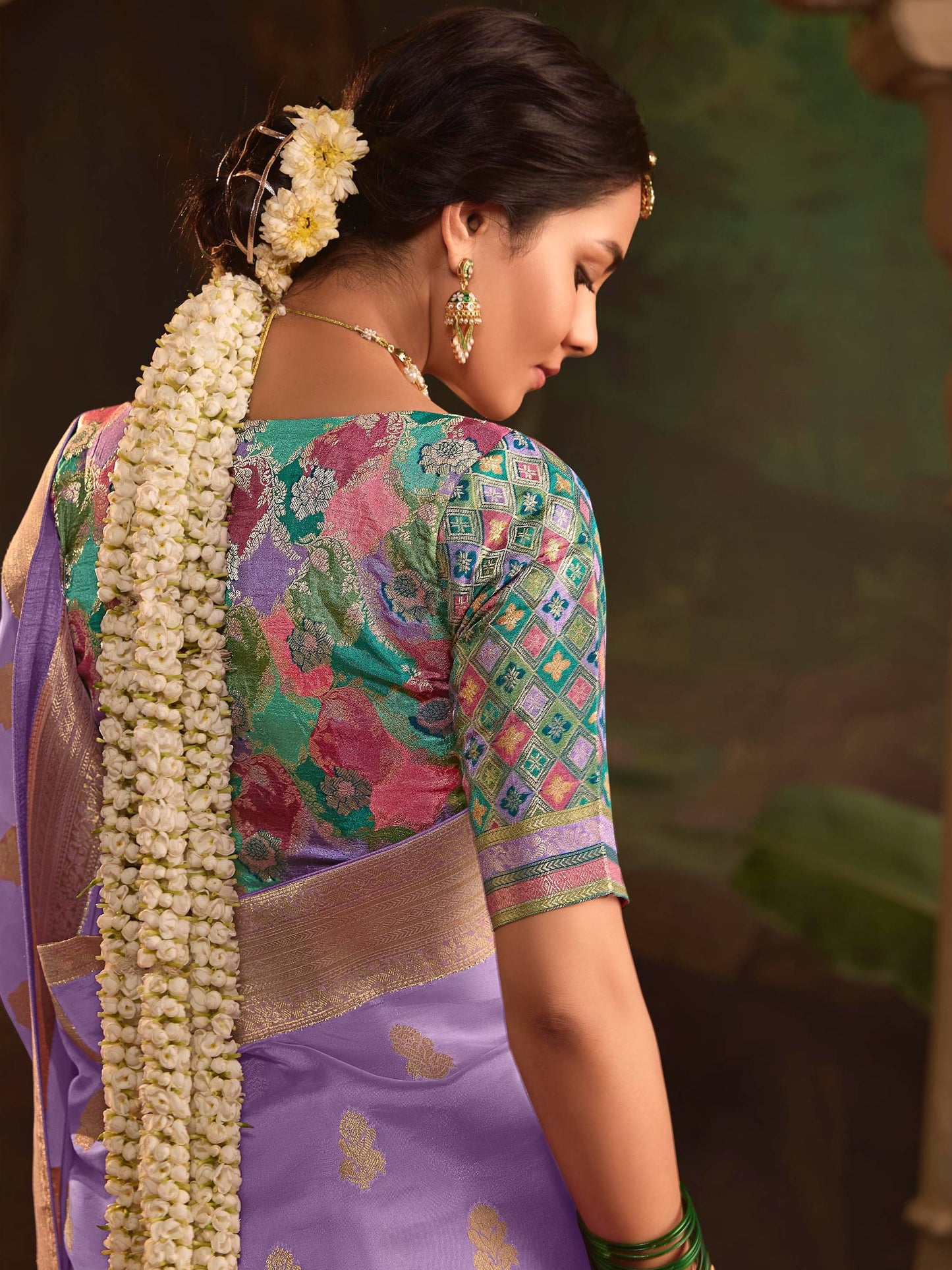 Dhiyona KM Women Royal Purple Saree With Contrasting Sea Green Blouse