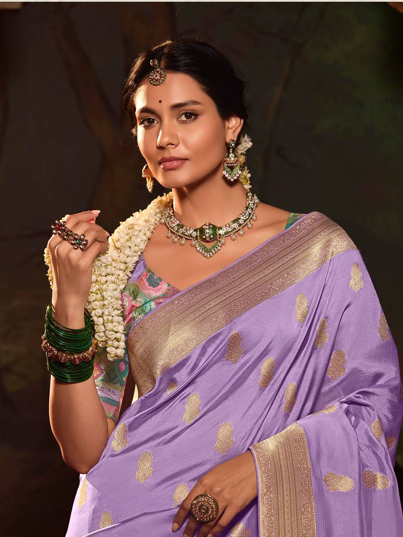 Dhiyona KM Women Royal Purple Saree With Contrasting Sea Green Blouse