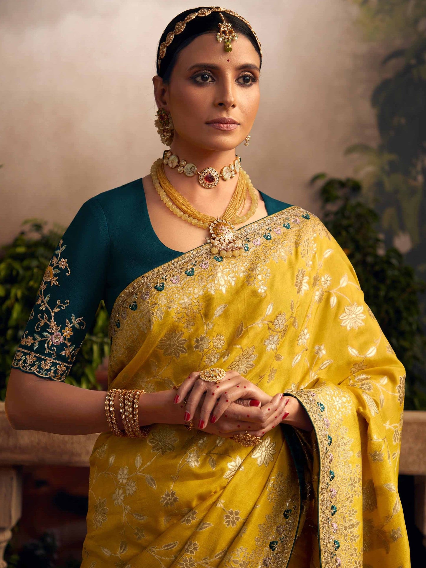 Dhiyona KM Women Vibrant Yellow Silk Saree With Teal Embroidered Blouse