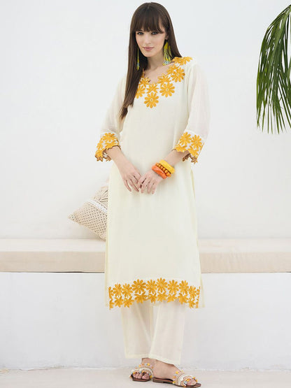 Women Floral Embroidered Cotton Kurta with Trousers