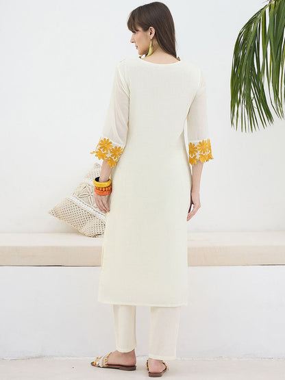 Women Floral Embroidered Cotton Kurta with Trousers