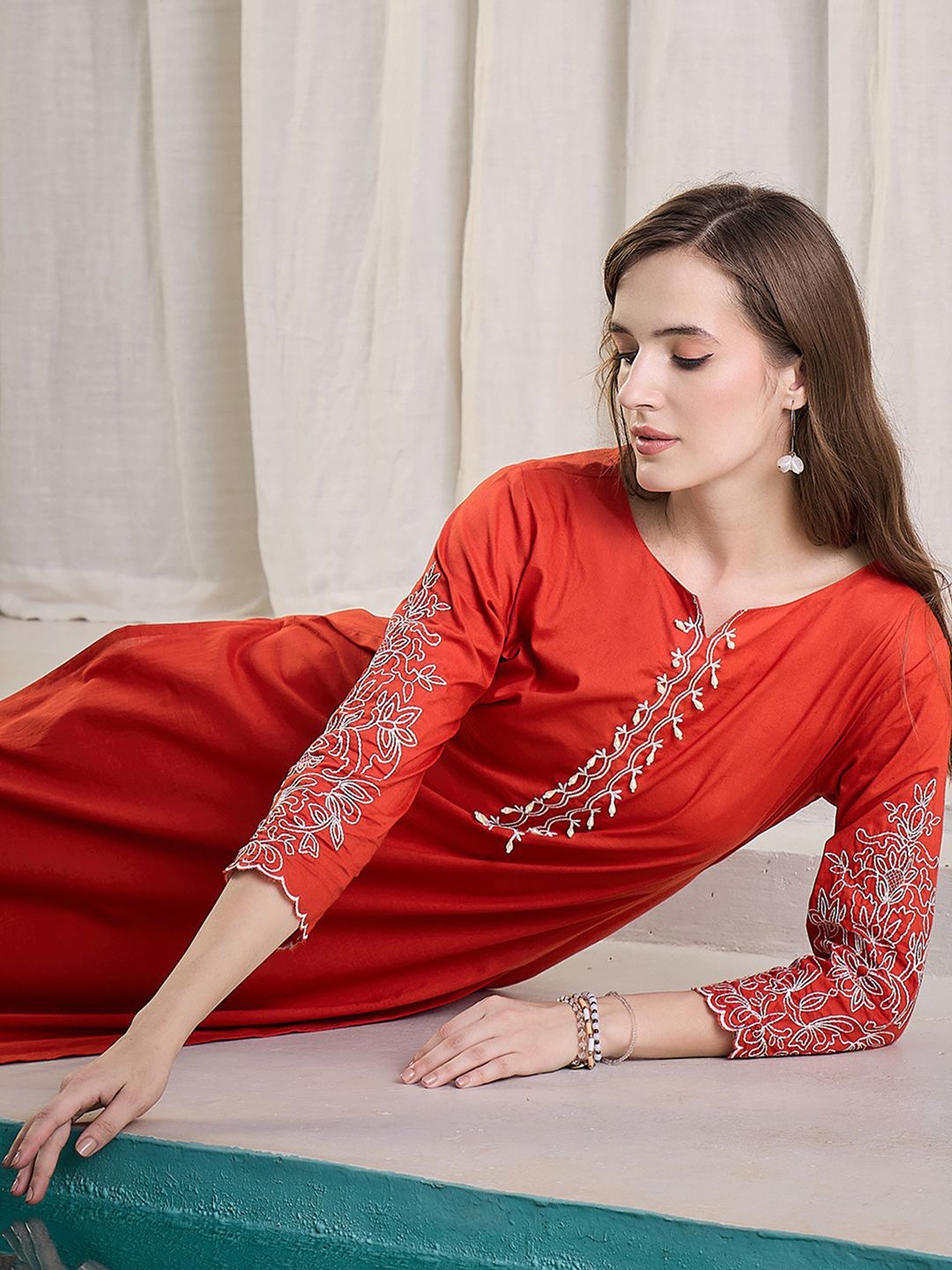 Women Ethnic Motifs Embroidered Cotton Kurta with Trousers