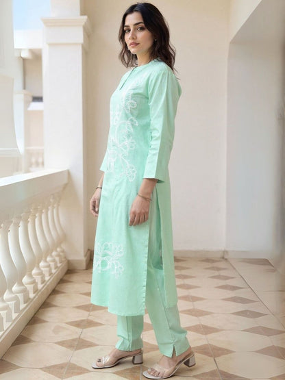 Women Floral Embroidered Cotton Kurta with Trousers