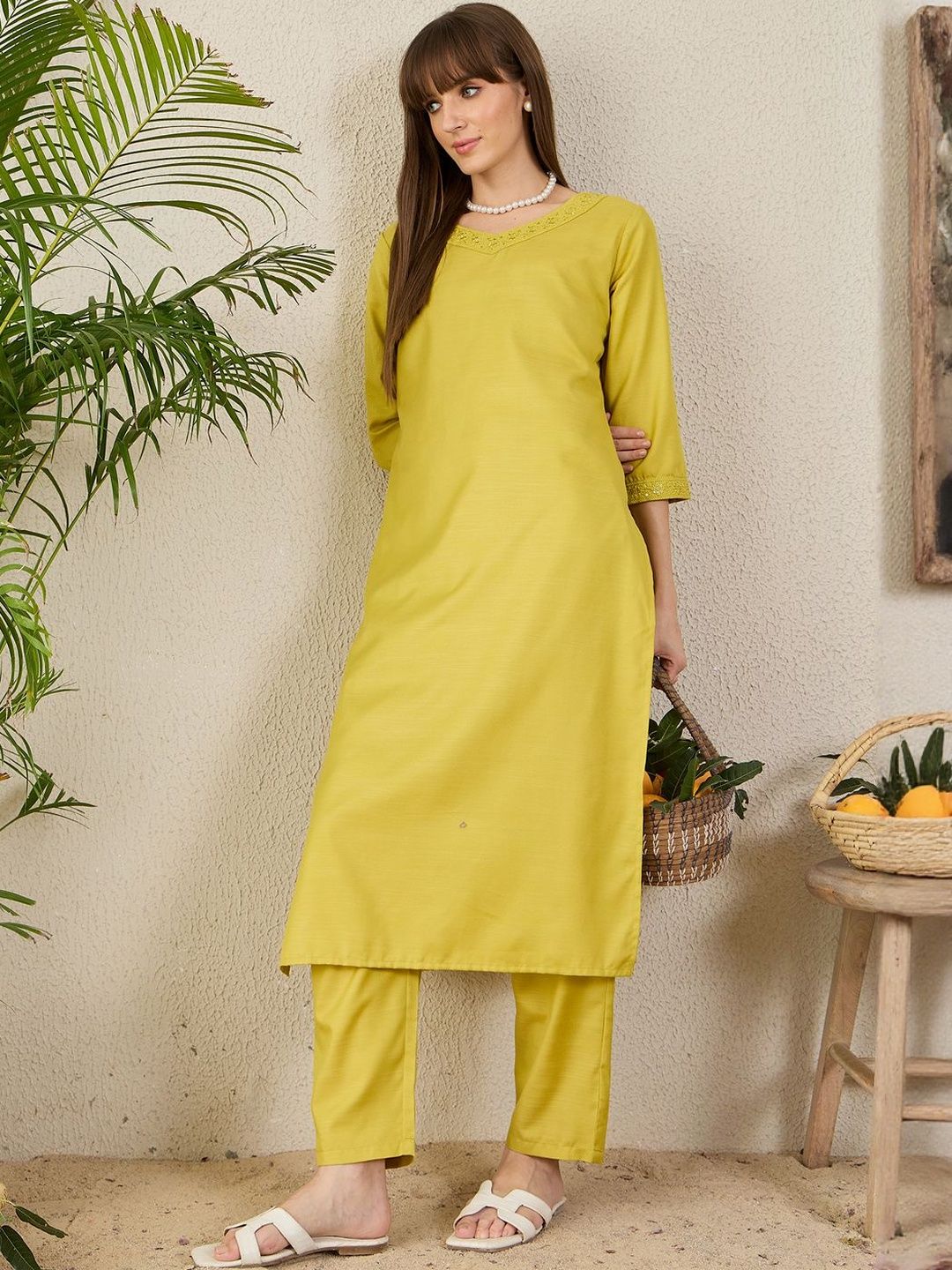 Women Solid Kurta with Trousers