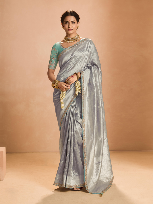 Dhiyona KM Women Elegant Silver Kanjivaram Silk Saree With Sea Green Embroidered Blouse