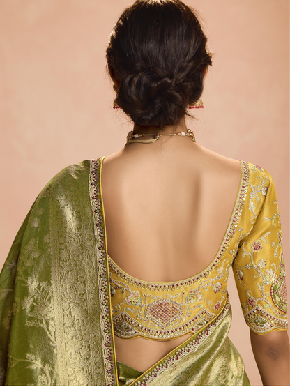 Dhiyona KM Women Radiant Green Kanjivaram Silk Saree With Ornate Yellow Blouse “ A Regal Ensemble