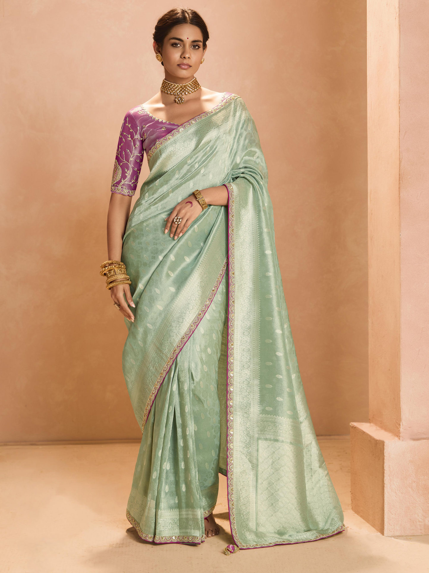 Dhiyona KM Women Mint Green Kanjivaram Silk Saree With Elegant Purple Embroidered Blouse “ A Dreamy Delight